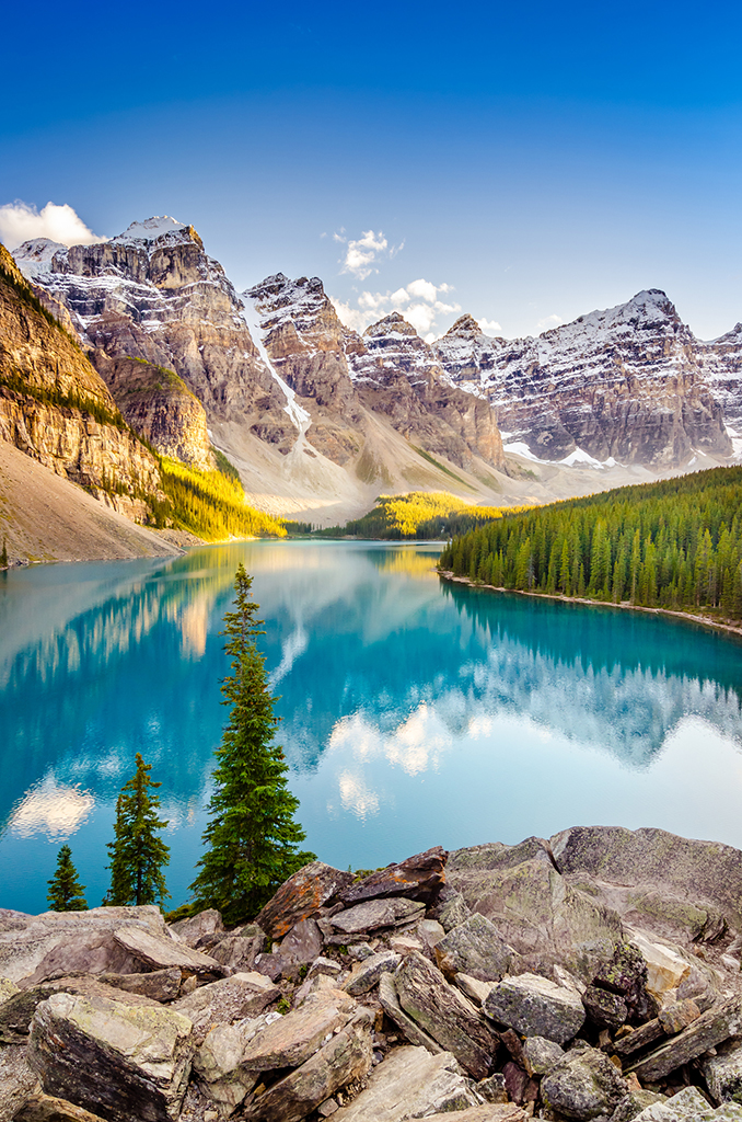 Landscape view of Moraine lake and mountain range at sunset in Canadian Rocky Mountains - AGM Meaningful Changes